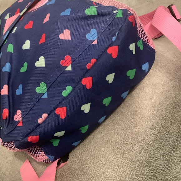 Protege colorful hearts on blue background backpack with pink accents. - Picture 7 of 7